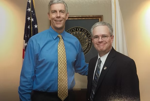 U.S. Education Secretary Arne Duncan with Russell Shilling at the Department of Education.